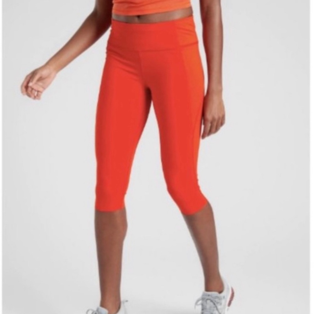 Athleta Velocity Crop Stash Pocket Leggings Orange